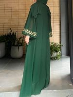 Abaya Dubai en vert émeraude, style contemporain et chic