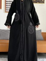 Abaya luxe noire conçue à Dubai, élégance impériale