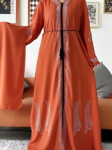 Vêtement traditionnel Dubai, abaya orange brûlé