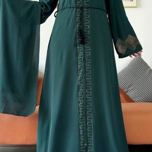 Abaya Dubai en vert émeraude, design chic et sophistiqué