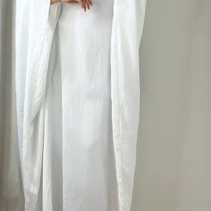 Abaya blanche en lin, parfaite pour les occasions spéciales et décontractées