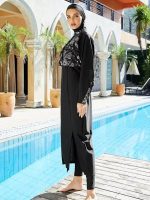 Maillot de bain couvrant noir avec motifs élégants