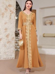 Caftan mariage or avec motifs raffinés