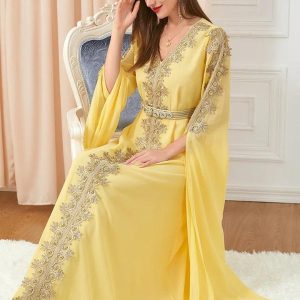 Caftan marocain élégant en teintes dorées
