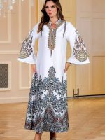 Vêtement traditionnel féminin, djellaba blanche à motifs floraux