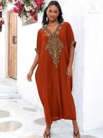Vêtement marocain élégant en orange vif