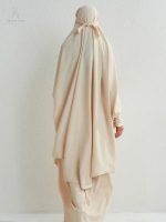 Jilbab beige polyvalent, facile à assortir avec d'autres tenues