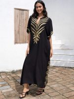 Robe djellaba noire avec motifs dorés élégants