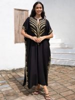 Djellaba noire au design raffiné et doré